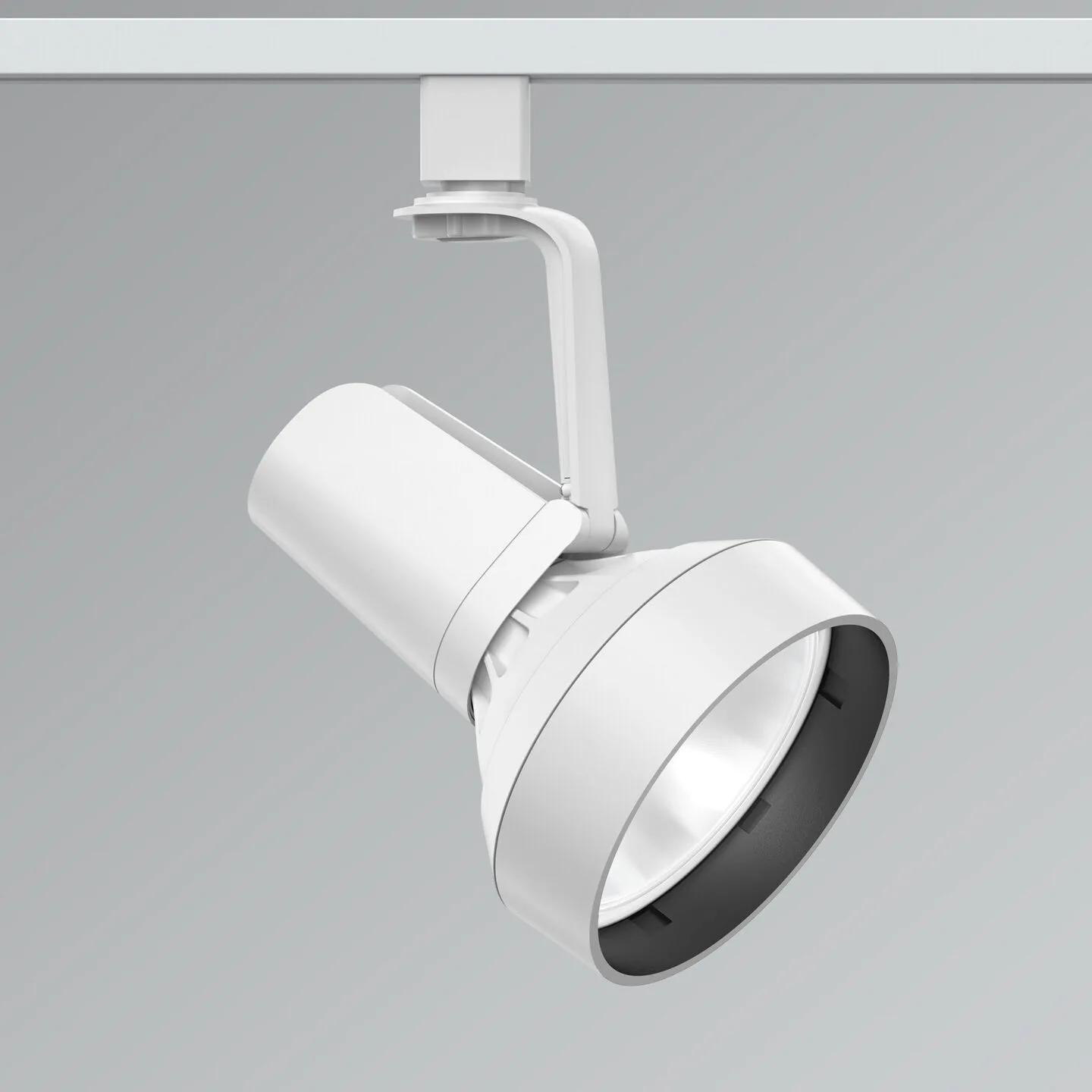 White adjustable track lighting spotlight mounted to a metal track against a gray background.